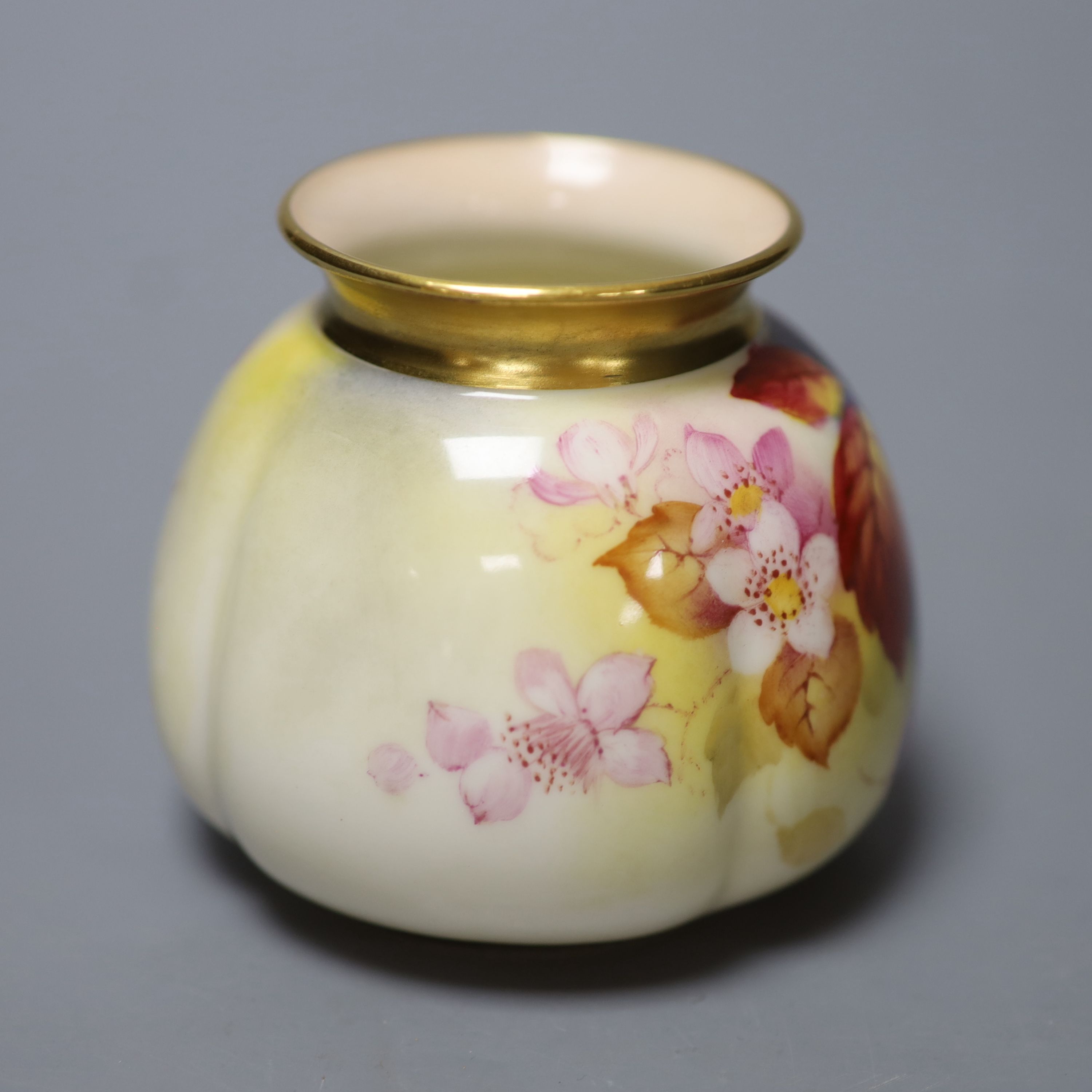 A Royal Worcester moulded vase shape 158H painted with autumnal leaves and berries by K. Blake, signed date, code 1939, height 7.5cm